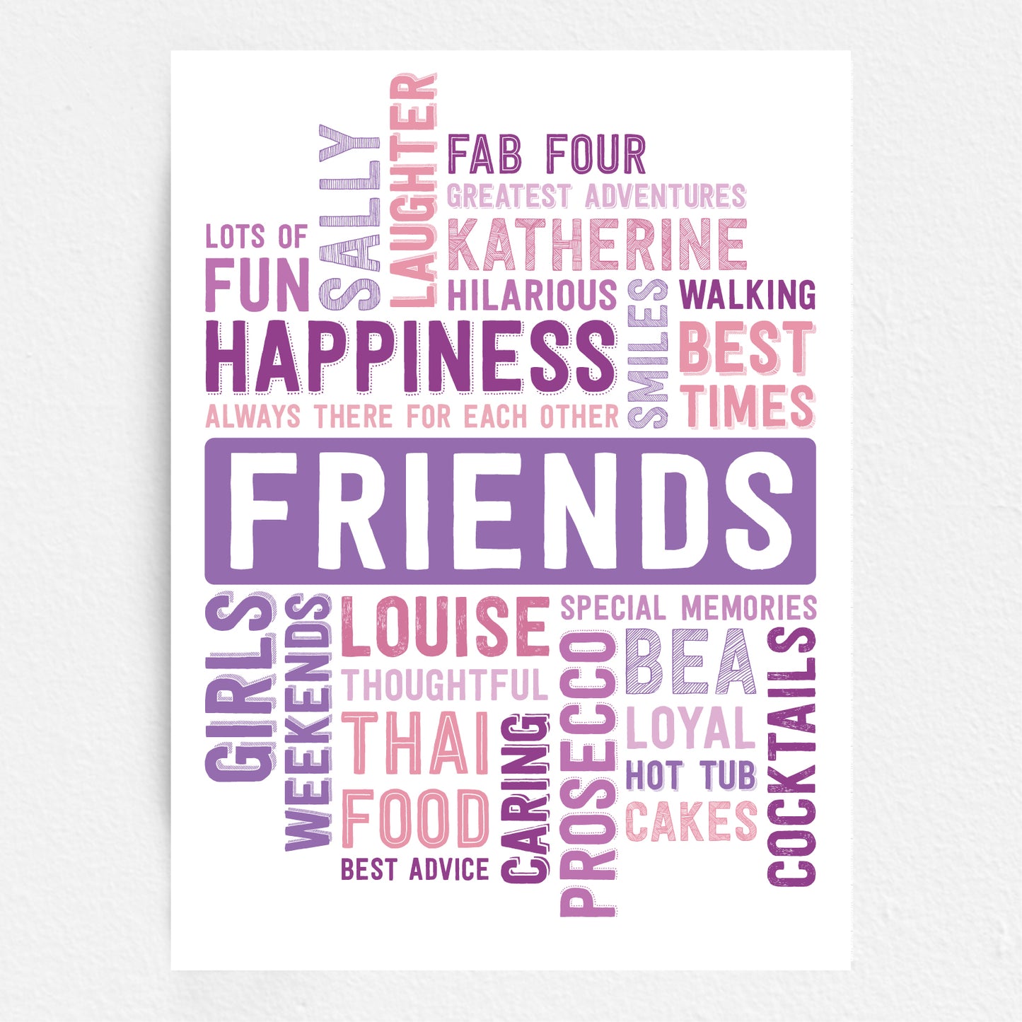Wall art with motivational phrases in purple and pink on a white background