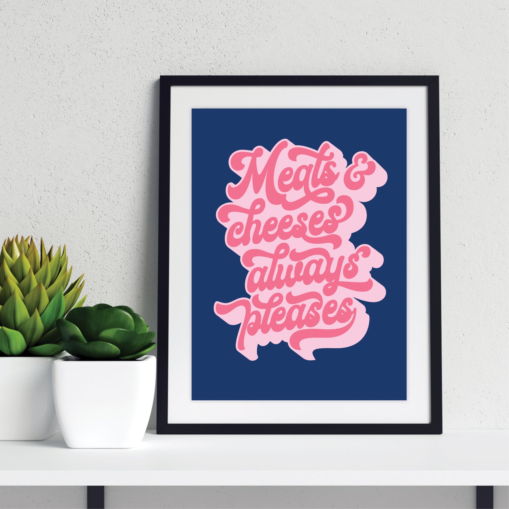 Art Print Pink text 'Meats & cheeses always pleases' on a blue background in a black frame with mount